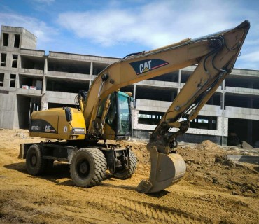 ЭКСКАВАТОР КОЛЕСНЫЙ CAT 318